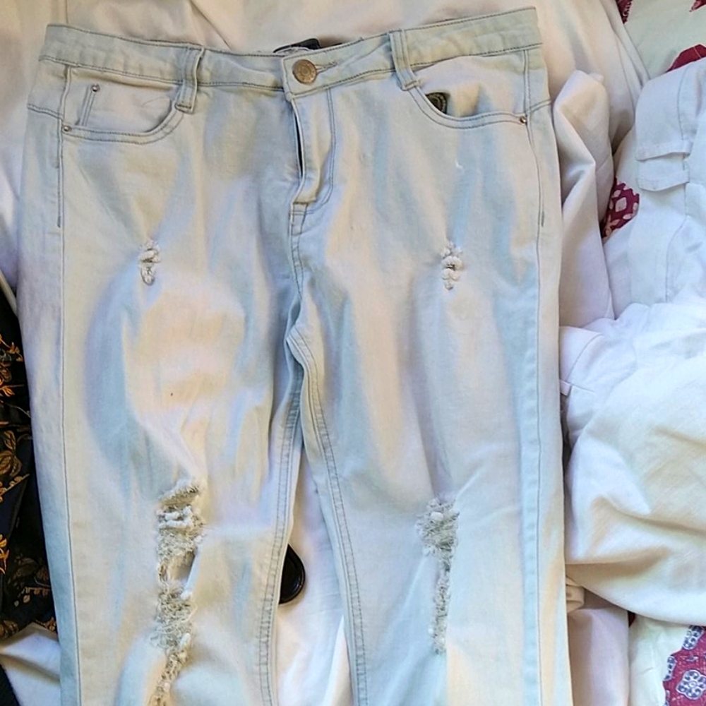 Distressed blue jeans